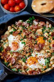 Spicy Egg Breakfast With Smashed Beans Pancetta Spicy Eggs Shakshuka Pancetta Breakfast