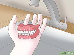 Dentures, not unlike natural teeth, can acquire stains from certain drinks like tea or coffee, or tobacco products. 4 Ways To Prevent Stains On Dentures Wikihow