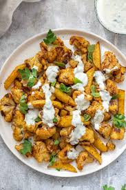 Add the spices, and you have a fantastic tasty meal! Moroccan Spiced Cauliflower And Potatoes With Herb Yogurt Sauce