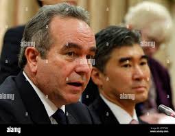 U.S. Assistant Secretary of State for East Asian and Pacific Affairs Kurt  Campbell, left, besides Sung Kim, U.S. nuclear envoy for the six party  talks, speaks to South Korean Vice Foreign Minister