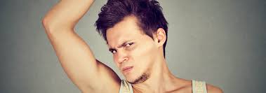 Why have my underarms gone green after my spray tan?