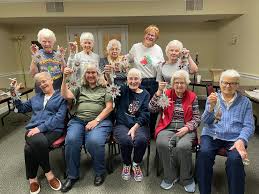 It was so great to have volunteer craft leader Val Moorhead back leading a  group today after an absence beyond her control. We made some really pretty  Christmas tree ornaments and we