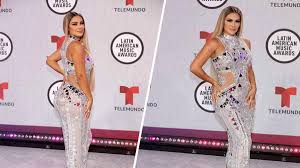 Ninel conde is a mexican singer and actress. Con Espejos Ninel Conde Luce Un Vestido Con Mucha Luz Para Los Latin Amas Telemundo Miami 51