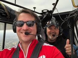 What apps or websites can be used to track flights