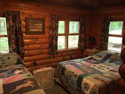 Escape into the serenity and beauty of pere marquette lodge and cabins! Cabins Pere Marquette River Lodge
