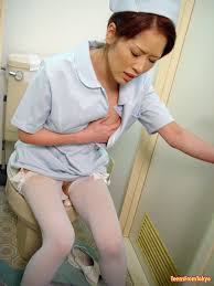Japanese nurse toying pussy