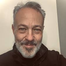 What year did Burgman 650 executive models start including heated grips and  seats?