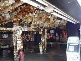 Trying to get the coin in the fish mouth at captain tony's saloon. Captain Tony S Saloon Florida Beach Bar