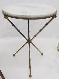 Maybe you would like to learn more about one of these? Cast Brass Faux Bamboo Tripod Tri Leg Round Side Table Marble Top At 1stdibs