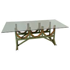 These unique glass top dining tables with metal bases are so modern chic! Two Customizable Industrial Metal And Wood Dining Room Table Bases For Sale At 1stdibs