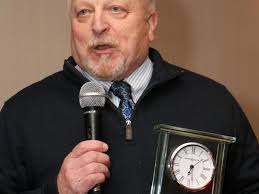 Page, honored by officials group, has learned some things