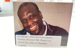 Autographed Dexter Manley Football Photo.