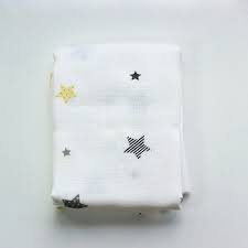 yildiz desenli muslin ortu star textured muslin swaddle ortuler kumas yildiz