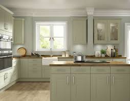 The Soft Olive Green Over Painting Of Our Somerset Olive Green Kitchen Gives A Finish That Offers A Mod Green Kitchen Cabinets Green Kitchen Kitchen Renovation