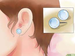 How To Take Care Of Pierced Ears With Pictures Ear Piercing Care Kids Ear Piercing Ear Piercings
