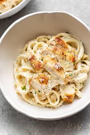 This homemade sauce combines simple, fresh ingredients like butter, cream and parmesan cheese to make a rich topping to our fettuccine pasta. This Chicken Fettuccine Alfredo Pasta Recipe Is Better Than The Olive Gard Chicken Alfredo Recipes Chicken Alfredo Fettuccine Recipe Fettuccine Alfredo Recipes