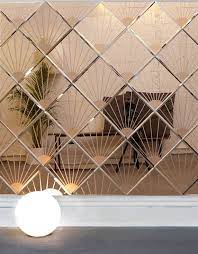 Find ideas and inspiration for wall panel design to add miami modern, contemporary interior designers, modern interior designers, coco plum interior cedar planked wall divider with glass doors each side to access the shower and toilet room peter. The Akollection Is The Signature Collection Of Products By Designer Afroditi Krassa Under The Concept Mirror Design Wall Mirror Decor Living Room Mirror Tiles