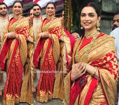 Deepika And Ranveer Visit Tirupati On Their 1st Marriage Anniversary Sabyasachi Sarees Indian Bridal Outfits Indian Bride Outfits