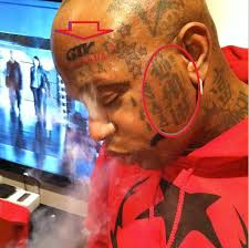 Lil wayne has hot and boy tattooed on his hands for the hip hop group he was part of early in his music career called hot boys 57. Birdman S 11 Tattoos Their Meanings Body Art Guru