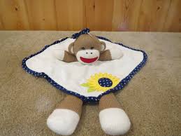 You can tumble dry on air setting only, no heat, after the blanket is dry to soften… Baby Starters Girl Sock Monkey Security Blanket Sunflower