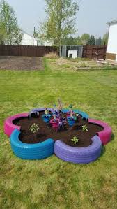 Tire Flower Shaped Planter Back Garden Landscaping Tire Garden Diy Garden Projects