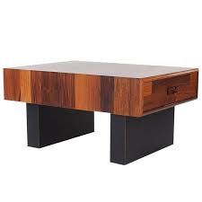 The beautiful organic walnut grain is highlighted in this simple contemporary coffee table. Mid Century Danish Modern Small Scale Drawer Coffee Table In Teak Rosewood At 1stdibs