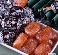 What is the name of the oval hard candy with plum or prune ...