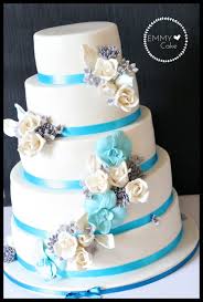 Some days ago, we got an inspiring reference to be discussed now, namely navy blue and silver wedding cakes in white. White Wedding Cake With Blue Silver And White Sugar Flowers Cakecentral Com