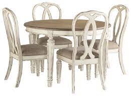 Set a generous table with our gorgeous dining room furniture, whether you're entertaining family and friends or enjoying a quiet meal at home. Realyn Dining Table And 4 Chairs D743 35 02 4 Dining Room Groups Price Busters Furniture