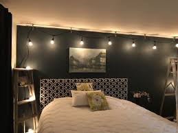 Hang Rope Lights With Curtain Rod For Lighting In Bedroom Navy Blue Accent Wall Blue Accent Walls Navy Accent Walls Hanging Bedroom Lights