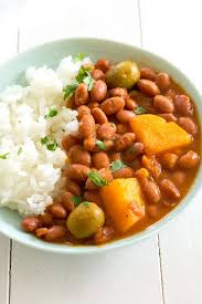 It is first sautéed in annatto oil or lard, and then the other recipe ingredients are added. Puerto Rican Rice And Beans Habichuelas Guisadas Kitchen Gidget