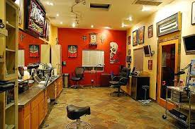Let our professionals exceed your expectations by designing your dream tattoo and making you look even stylish. Mister Cartoon S Tattoo Shop Los Angeles Tattoo Studio Tattoo Shop Interior Shop Interiors