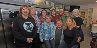 Taunton business, volunteers give back to community one load of laundry at  a time