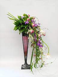 Overall rating of 3.5 from 6 votes. 9 Waterfall Design Ideas Flower Arrangements Floral Arrangements Waterfall Design