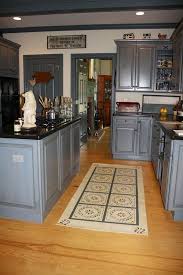Beautiful blue kitchen cabinet ideas the spruce blue is a notice me hueathat s why we re obsessed with kitchen cabinets in the ultra popular 100 country kitchen ideas for 2019 home stratosphere yellow lighting is always the preferred lighting in a country style kitchen to be honest all country. Pin By Cecy Carrillo On Primitive Historic Architecture Primitive Kitchen Cabinets Country Kitchen Kitchen Remodel
