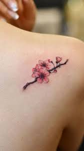 Danity Cherry Blossom Tattoos And Their Meaning Blossom Tattoo Cherry Blossom Tattoo Tattoos With Meaning