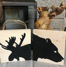 Called `elk' in europe and `moose' in north america. Woodland Animal Moose Bear Silhouette Mini Wood Wall Etsy In 2020 Bear Decor Moose Decor Bear Silhouette