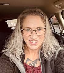 Can someone please make this into a headshot for a work lanyard. Thank you. 