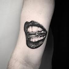 Tattoo artists use different colors and actions to emphasize a particular intention. Everything You Need To Know About Kiss Tattoos Tattoo Icon