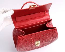 For every imperfection, value decreases which is why crocodile farmers take precautionary measures such as covering corners of enclosures with plastic, to keep their crocodiles in good condition. Crocodile Leather Evening Handbag Crocodile Leather Wrist Bag Evening Handbag Leather Crocodile Leather