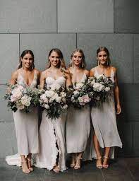 22 Chic Tropical Bridesmaid Dresses To Steal Stunning Bridesmaid Dresses Midi Bridesmaid Dress Bridesmaid Dresses