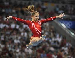 What events do the gymnasts compete on Shawn Johnson Explains How 2020 Olympics Postponement Could Affect Us Gymnastics Team Exclusive Entertainment Tonight