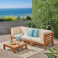 Noble House Jonah Teak Finish 2 Piece Wood Patio Deep Seating Set With Beige Cushions 3 Seater Sofa Coffee Table 55008 The Home Depot Teak Sofa Patio Sectional Wood Patio
