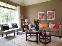 Earth Toned Living Room With Vibrant Color Accents Earth Tone Living Room Living Room Color Schemes Earthy Living Room