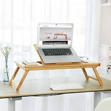 The laptop stand is made of sturdy aluminum, you can incline it at different angles and stand it up higher or lower depending on your needs. 10 Best Laptop Tables And Carts 2021 The Strategist