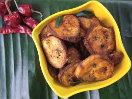 Now pour these sliced pieces in water so that they do not become black and keep the vessel. Raw Banana Fry Recipe Vazhakkai Varuval Side Dish Hatty Foods