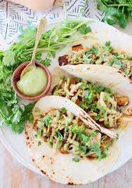 Butternut Squash Tacos Are Made With Sauteed Butternut Squash Crispy Onion Strings And A Creamy Avocado Sauce Butternut Squash Tacos Recipes Sweet Chili Sauce