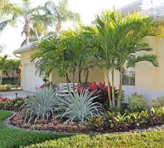 40 Handsome Tropical Front Yard Landscape Ideas For Your Home Tropical Landscaping Tropical Landscape Design Front Yard Landscaping Pictures