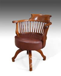 Curved lumbar spindles and the sculpted seat are comfortable. Antique Office Chair Antique Captains Chair Swivel Chair Rotating Chair Leather Captains Chair Antique Swivel Chair Antique Chairs Uk Antique Desk Chairs Antique Dining Chairs Antique Side Chairs