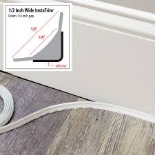 I've had a few people ask how to use this stick on edge banding. Instatrim 1 2 In Wide X 10ft Long 2 Pack White Moldings And Trim Baseboards Baseboard Trim